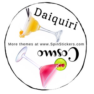 May include: A round sticker with a black outline featuring two cocktails, a yellow daiquiri and a pink cosmo. The text "Daiquiri" and "Cosmo" are written in a stylized font. The text "More themes at www.SpinStickers.com" is also included.