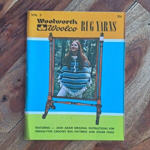 May include: Vintage Woolworth Woolco Rug Yarns book, Vol. 2, featuring Jean Adair's instructions for Indian-type crochet rug patterns. The cover has a woman wearing a poncho inside a wooden frame, with a yellow, blue, and green color scheme.