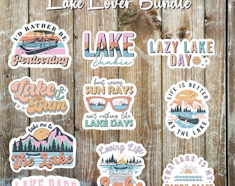 May include: A set of ten colorful stickers with lake-themed designs. The stickers feature phrases like "Lake Junkie", "Lazy Lake Day", "Take Me To The Lake", and "The Lake Is My Happy Place".