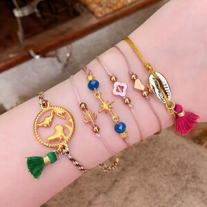 schönes Armband mit Weltkarte-Zwischenstück