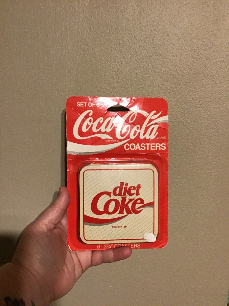 Reduced 4 Coke coasters with vintage pictures Reduced 4 Coke coasters with vintage pictures