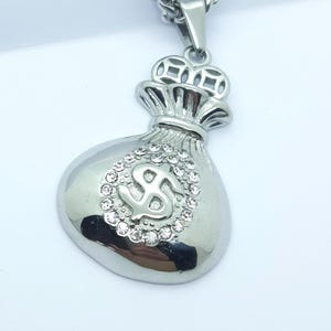 Collana con ciondolo a forma di sacco di soldi, con sacco di dollari, portafortuna, collana in acciaio inossidabile da uomo