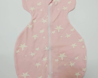 A baby sleeping bag, with arms up, dobble zipper is the gift that will be practical, will help calm the baby and allow the mother to rest