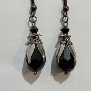 Black Teardrop Crystal Flower Earrings finished in gunmetal black colour. Unusual Gothic Gift. Unique Handmade Jewellery