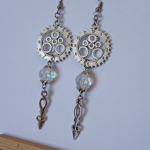 Silver Steampunk Clock Earrings with Mystic Aura Fairy Crystals and closures to choose from. Unique Steampunk Jewellery Handmade in the UK