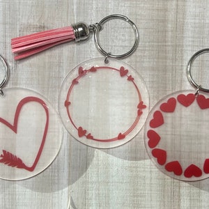 Acrylic Disc Keychain with Heart Wreath Design & Tassel