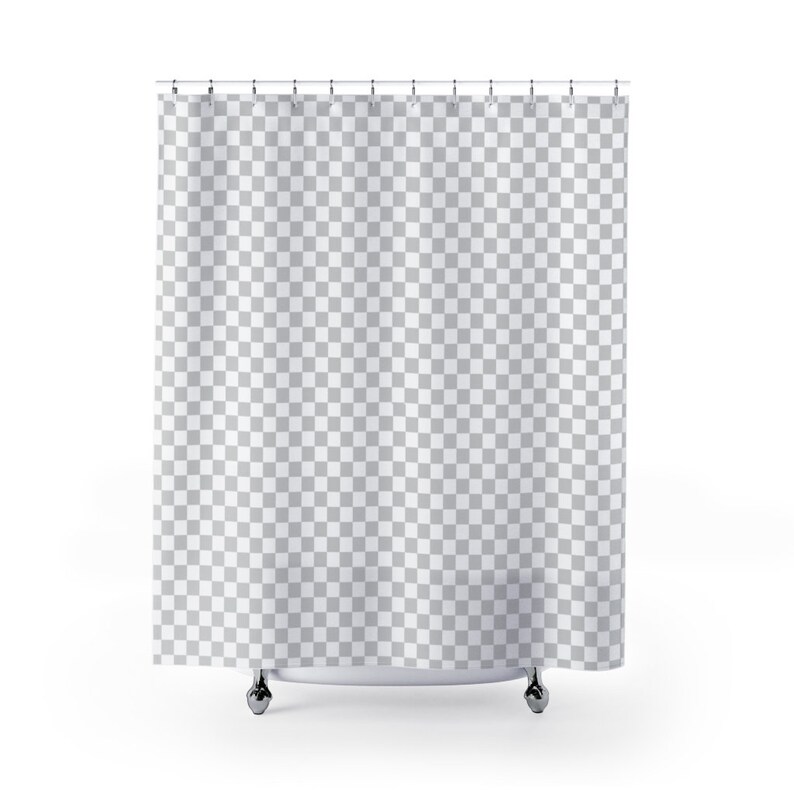 May include: A white shower curtain with a checkered pattern hangs from a silver shower rod. The curtain is made of a soft, water-resistant fabric.
