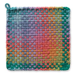 May include: A square, woven hot pad in a vibrant array of colors, including shades of pink, orange, green, blue, and purple. The edges are finished with a looped corner for hanging. The woven design creates a textured surface.