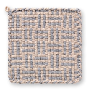 May include: A square, woven potholder in a geometric pattern. The potholder features a repeating design of alternating light beige and gray squares. A small loop is attached to one corner for hanging.