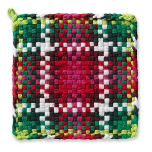May include: A square, woven hot pad with a loop for hanging. The pad features a geometric pattern in shades of red, pink, green, white, and brown. The edges are finished with a green border.