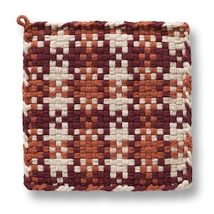 May include: Square woven pot holder in a geometric pattern. The pot holder features a loop for hanging and is made of woven fabric in shades of burgundy, orange, and cream. The design is a repeating pattern of squares and rectangles.