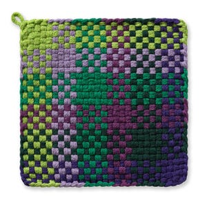 May include: A square, woven hot pad in shades of green, purple, and dark blue. The design features a gradient pattern, transitioning from light green to dark blue. A small loop is attached to one corner for hanging.