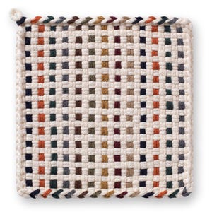 May include: Square woven pot holder with a checkerboard pattern in cream, orange, green, brown, and navy blue. The edges are trimmed with a braided border in coordinating colors. A loop is attached for hanging.