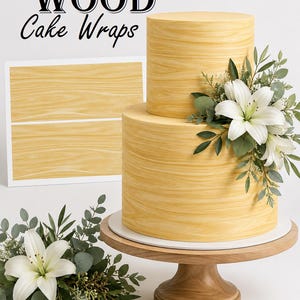 May include: A two-tier cake featuring a light yellow wood grain pattern wrap, decorated with white lily flowers and green eucalyptus leaves. The product is displayed on a wooden cake stand, with additional wood grain wrap sheets visible in the background.