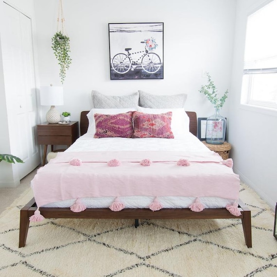 Pink pom pom throw blanket hotsell