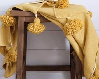 Mustard pom pom throw hotsell