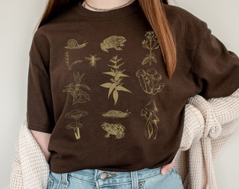 Goblincore clothing Mushroom Apparel.  Frog Snail Slug Weeds. Cottagecore. Autumn fall aesthetic.  Goblincore Aesthetic. On Trend Fashion