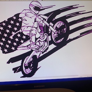 May include: A black and white silhouette of a motocross rider performing a wheelie with an American flag behind them.