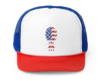 May include: A white trucker hat with a red brim and blue mesh back. The front of the hat features a pineapple design with the American flag colors.