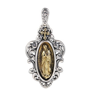 May include: A silver pendant with an ornate design features a gold oval medallion with an image of the Virgin Mary. The pendant has a loop at the top for attaching to a chain.