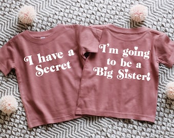 J'ai un secret, je vais être une grande soeur, chemise grande soeur, t-shirt grande soeur, t-shirt mauve grande soeur, faire-part de grossesse