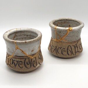 Kintsugi Repair of Handmade Stoneware Cups | Vessel | Decor | Peace | Love | Joy | Kintsukuroi | Meaningful Gifts | Unique Ceramic Decor