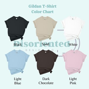 May include: Colour chart for Gildan T-shirts showing six different colours: black, sand, white, light blue, dark chocolate, and light pink.