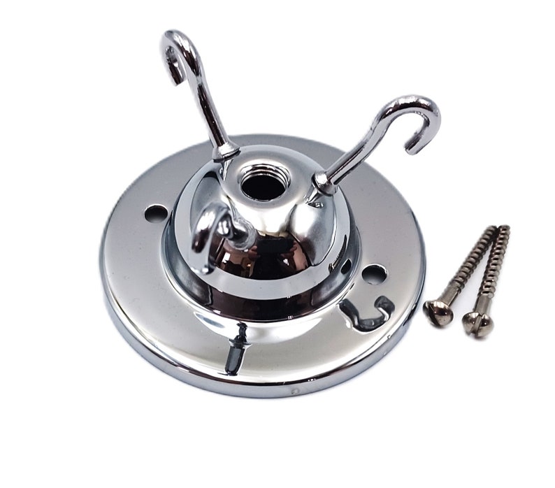 May include: Chrome ceiling fixture with three hooks and two screws. The fixture is designed to hold light bulbs or other hanging objects.