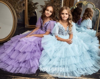 Fluffy tulle baby dress with tulle ruffles on the skirt and gorgeous lace on the bodice. Dress with 3D flowers, beads and sequins