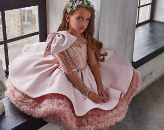 Dress with a large bow on the shoulder. Ball gown puffy lush short dress. Delicate pink fluffy dress. White dress for a flower girl