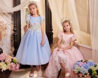 Light organza dress for a girl. Dress with colored floral lace. Radiant pink midi length dress. Dress with short sleeves-lanterns with lace.