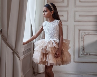 Short dress for a flower girl with a chic shining guipure bodice with 3D flowers. Shoulders with threads with crystal beads Ivory girl dress