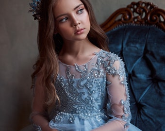 Sky blue dress with a delicate pattern on the bodice and sleeves embroidered with sequins, glass beads and crystal beads. Princess Dress