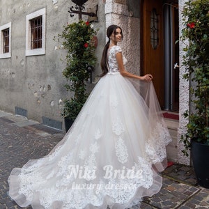Vestidos de novia acampanados hot sale