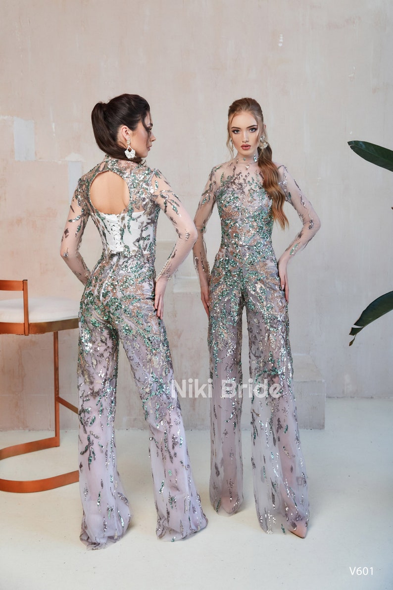 Shining jumpsuit A wonderful elegant set consisting of a blouse with long sleeves and trousers A great alternative to a prom dress