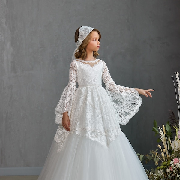 White lace communion dress with long flared lace sleeves. Communion dress with long sleeves. Matte lace communion dress with beads