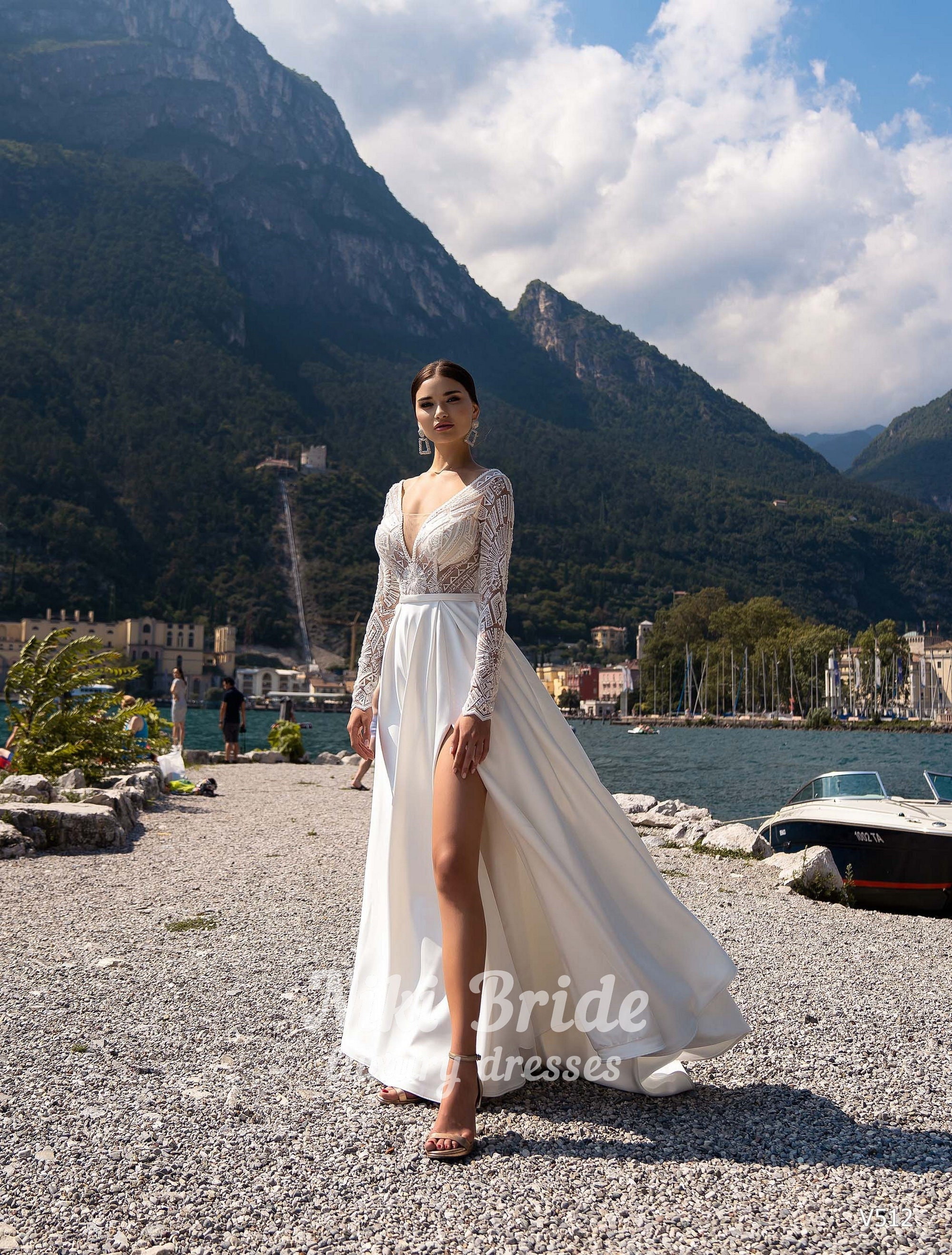 Wedding Dress With Lace Top and a Satin Skirt With a Slit. the