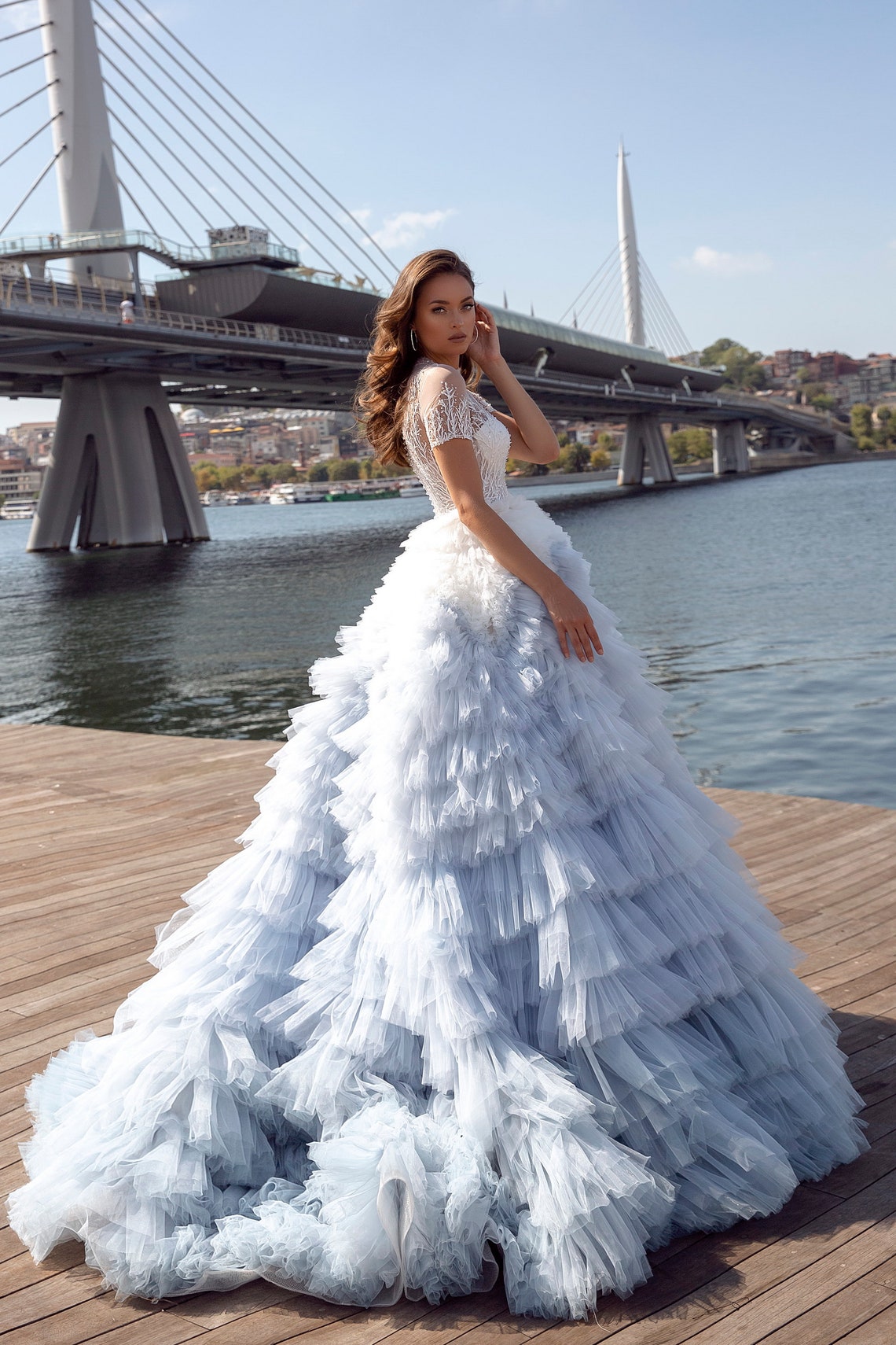 An airy wedding dress-cloud created by layers of delicate image 4