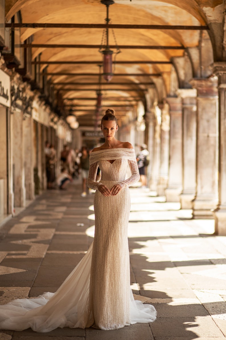 Straight lace wedding dress. Shiny lace dress with long sleeves. Straight shiny dress with a bow. Ivory wedding dress with Godet silhouette image 2