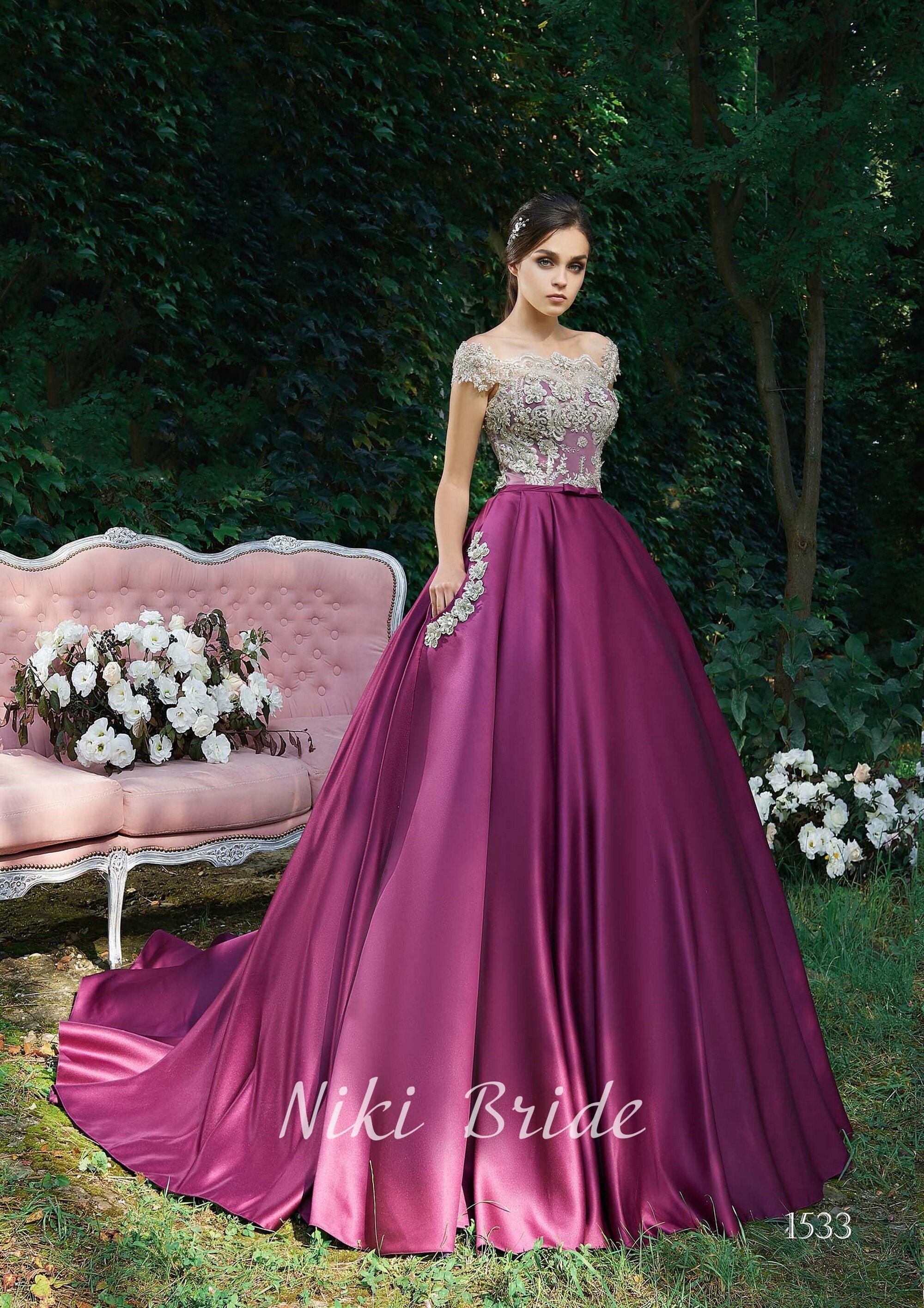 Satin Puffy Prom Dress With an 