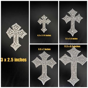 May include: A white ceramic mug with a black handle and the text "But First, Coffee" in a black, handwritten-style font. The mug is on a white surface.