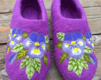 May include: Purple felt slippers with embroidered purple pansies and green leaves.