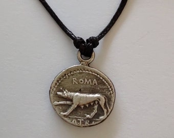 Ancient Rome coin replica, small silver pendant, Lupa Capitolina, she wolf ROMA, denarius first century BC, museum shop, history reenactment