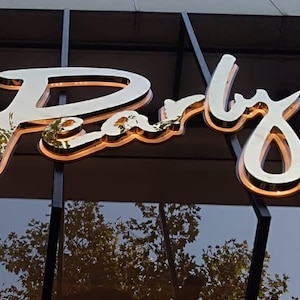 Custom LED Backlit Business Sign: 3D Stainless Steel Halo Lit Letters