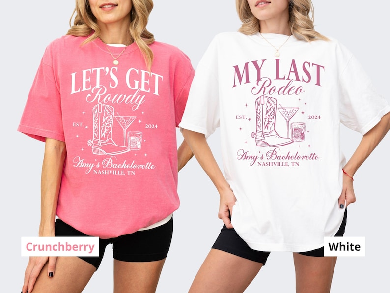 May include: Two white t-shirts with pink and white text and graphics. The left shirt says "Let's Get Rowdy" with a boot and a drink. The right shirt says "My Last Rodeo" with a boot and a drink. Both shirts say "Amy's Bachelorette Nashville, TN" and "Est. 2024".