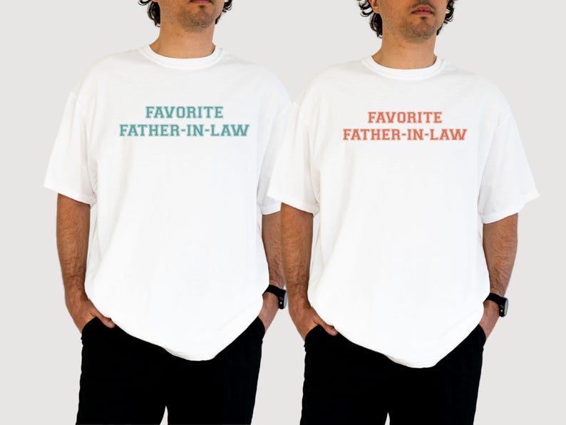 May include: Two white t-shirts with the text "FAVORITE FATHER-IN-LAW" printed on the front. One shirt has the text in teal, the other in coral. The models are wearing black pants and a black watch.