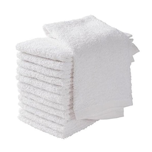 May include: A stack of white, fluffy, square towels. The towels are neatly folded and stacked, with a few towels slightly offset from the main stack. The towels appear to be made of a soft, absorbent material.