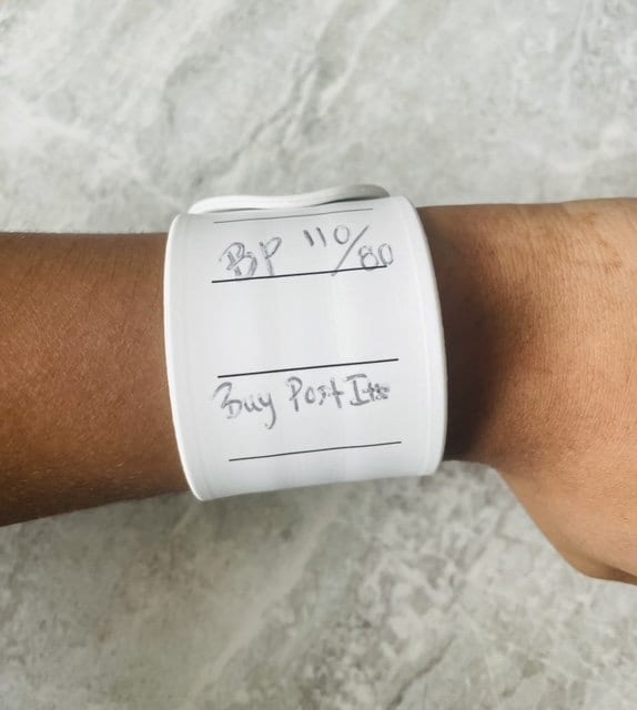 A hospital ID bracelet on a baby s wrist