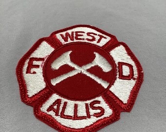 Toppa del dipartimento dei vigili del fuoco del Wisconsin di West Allis, nuova vecchia scorta