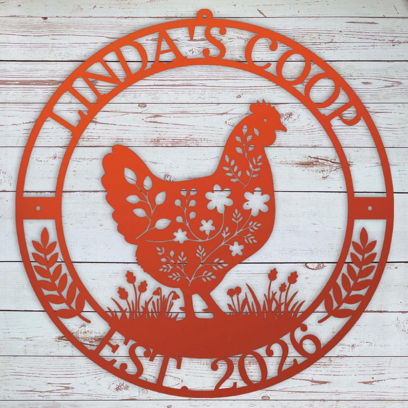 round metal chicken coop sign that's orange with name and date